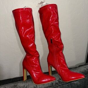 True red knee high pointed heel